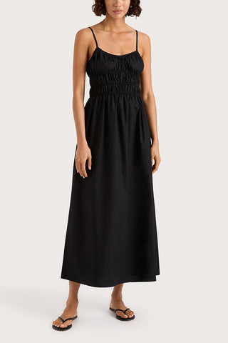 Black midi length dress from Faithfull the Brand, available at Zane boutique in Portland, Maine. 