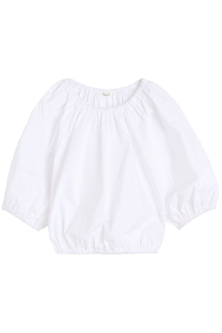 By Malene Birger Lelow Blouse in Pure White, featuring a voluminous silhouette in crisp 100% organic cotton. This versatile top includes an elasticated neckline for on or off-the-shoulder styling, finished with puffed sleeves and an elasticated hem.