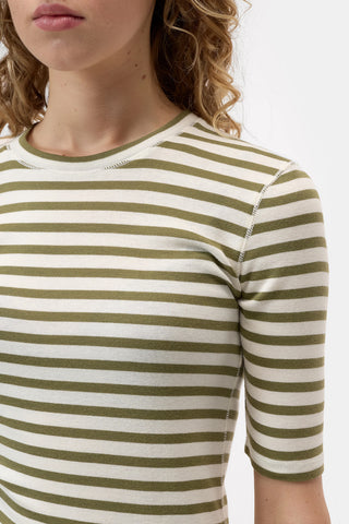 The Closed Crewneck Short Sleeve in Hunter Green is a premium organic cotton t-shirt featuring a classic horizontal stripe pattern and a comfortable ribbed neckline. This versatile designer top offers a relaxed fit and elbow-length sleeves, making it a sophisticated essential for effortless everyday layering.