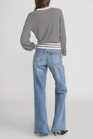 Frame Striped Knit Sweater in Cream Multi featuring soft bubble sleeves, a blouson silhouette, and classic navy horizontal stripes. This luxurious cotton-modal blend pullover is a versatile transitional piece perfect for effortless, coastal-inspired styling.