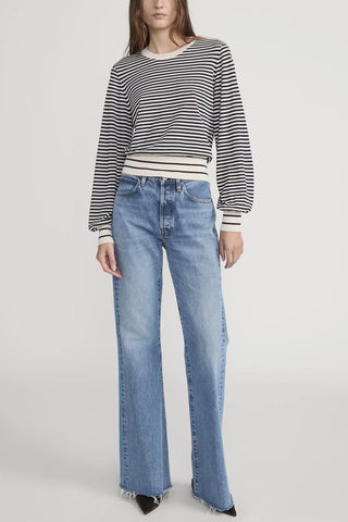 Frame Striped Knit Sweater in Cream Multi featuring soft bubble sleeves, a blouson silhouette, and classic navy horizontal stripes. This luxurious cotton-modal blend pullover is a versatile transitional piece perfect for effortless, coastal-inspired styling.