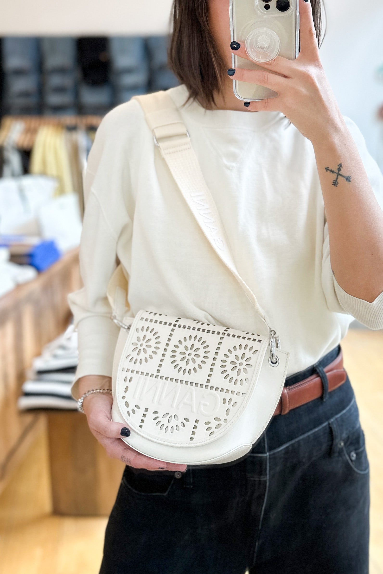 Perforated handbag cheap