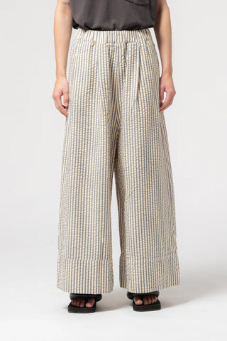 Girls of Dust Culotte Pant in Iron/Off White, featuring a bold vertical stripe pattern and a relaxed, wide-leg cropped silhouette. These high-waisted designer trousers are crafted from durable cotton for a comfortable, utilitarian look.