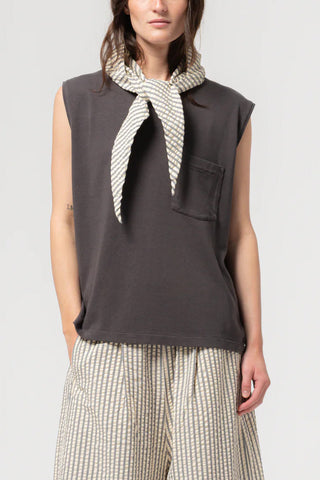 Girls of Dust Jackie Scarf in Iron/Off White, a versatile striped accessory made from durable Fuji nylon with a unique tie-front design. This lightweight designer headscarf or neck wrap adds a modern, utilitarian edge to any casual outfit, making it a perfect year-round layering piece.