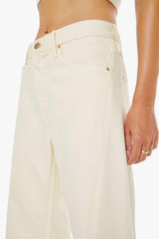 Mother Lemon Twist Sneak jeans in Natural, featuring a high-waisted fit and a modern wide-leg silhouette in a versatile creamy off-white wash. These premium stretch-denim trousers offer a sophisticated, elongated look that transitions perfectly from casual daytime to elevated evening wear.