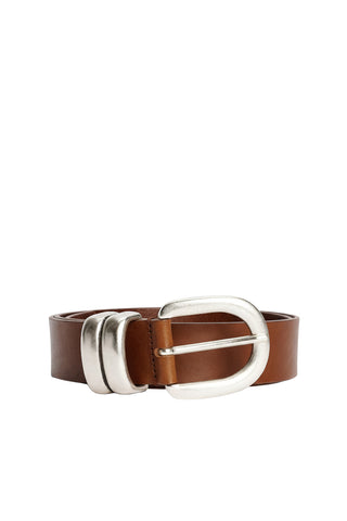 By Malene Birger Zoira Belt in Dark Brown, a luxury leather waist belt featuring a sculptural silver-tone buckle and distinctive double-loop hardware. This elevated designer accessory adds a polished, waist-defining touch to oversized blazers or flowing dresses.
