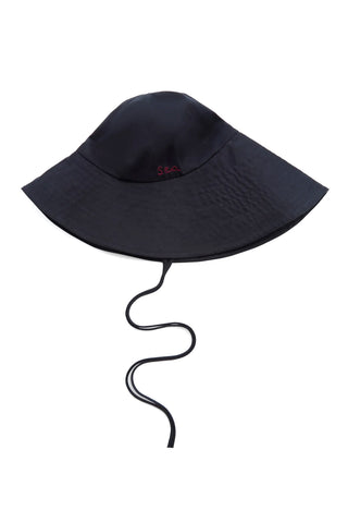 Sea New York Lois Twill Hat in Navy is a neutral toned hat featuring six panel construction and adjustable tie chin strap. Versatile spring and summer accessory.