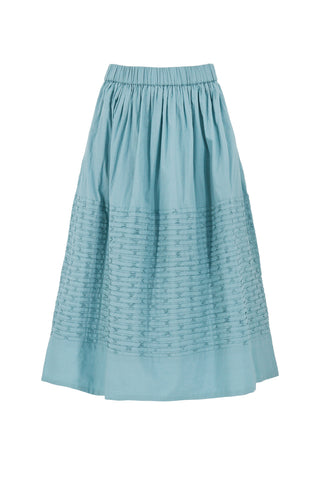 Sea New York Violet midi skirt in blue featuring delicate pintuck detailing, an elasticized waistband, and a breezy A-line silhouette. This lightweight cotton skirt offers a relaxed fit, making it a perfect effortless piece for a fresh spring outfit.