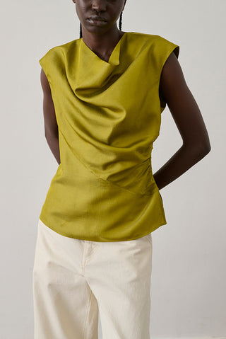 SOEUR Eclat Top in Absinthe at Zane. This 100% silk sleeveless top features a draped cowl neck and architectural silhouette.