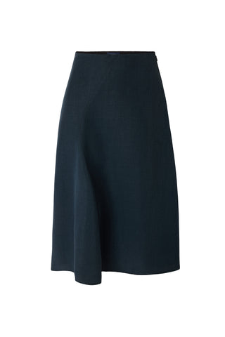 Soeur Gali Skirt in Petrole, a sophisticated midi-length A-line skirt crafted from a premium wool blend in a deep teal-blue hue. This elegant designer skirt features a clean waistline and a fluid drape, offering a polished silhouette that pairs perfectly with slim knits or a crisp button-down.