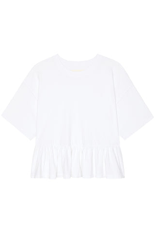 Oversized Ruffle Peplum Tee from The Great is a short sleeve cotton T-shirt featuring a crew neckline and ruffled hem. Elevated basic, perfect for your spring and summer wardrobe. 