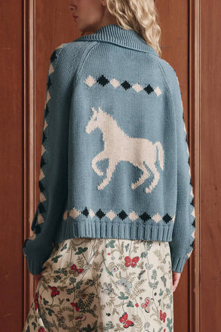 The Great Stable Lodge Cardigan is a chunky vintage inspired knit sweater featuring a classic open front and relaxed shawl collar. Luxury timeless cardigan with a lodge style aesthetic. 