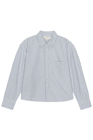 A cropped, light blue and white striped Oxford button-down shirt featuring a traditional pointed collar, long sleeves, and a single chest pocket. Boxy, relaxed silhouette. 