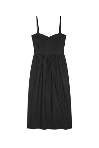 The Great Verse Dress in Black, a sophisticated midi-length sundress featuring a flattering sweetheart neckline and delicate spaghetti straps. This versatile 100% cotton dress offers a timeless, feminine silhouette that transitions seamlessly from elevated daytime events to chic evening gatherings.